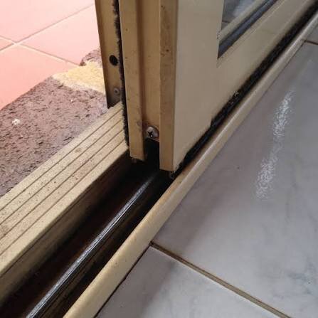 Sliding door track and roller close-up